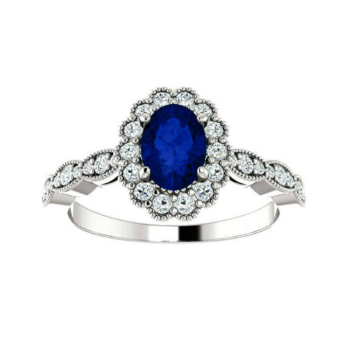 1 Carat Oval Sapphire & Diamond Scalloped Halo Ring